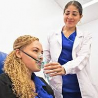 Sesion de terapia respiratoria en el consultorio. Dra. Osorio